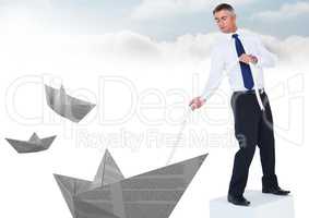 Businessman with paper boats and rope in sky