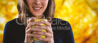 Composite image of portrait of woman holding coffee cup