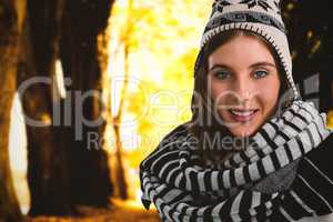 Composite image of portrait of smiling young woman with scarf