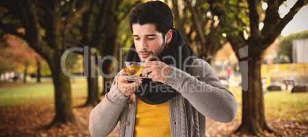 Composite image of young man having lemon tea