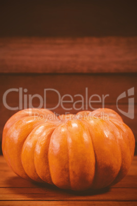 Pumpkin on wooden table during Halloween