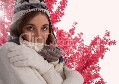 Woman in Autum with hat scarf and gloves with tree