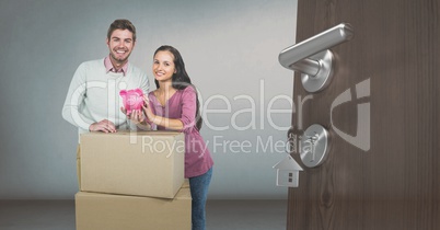 people moving boxes into new home