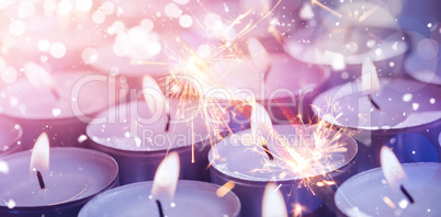 Composite image of illuminated candles during christmas time
