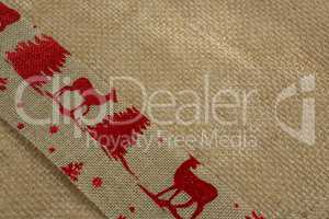 High angle view of embroidered burlap