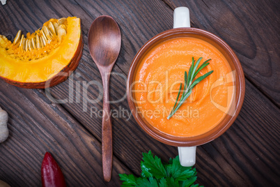 creamy pumpkin soup in a ceramic plate