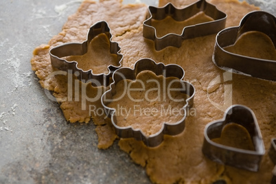 Gingerbread dough with flour and cookie cutter