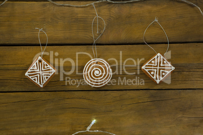 Overhead view of gingerbread cookies on wooden table