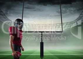 american football  player standing in stadium