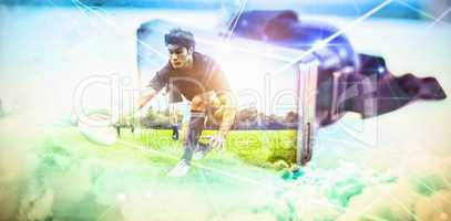 Composite image of rugby players training on pitch