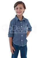 Boy posing against white background