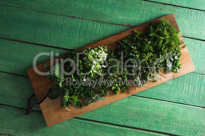 Various herbs on a chopping board