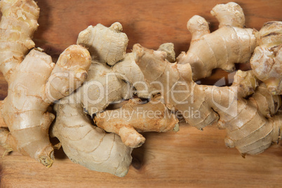 Directly above view of gingers on cutting board