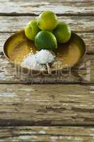 Lemon and salt in plate