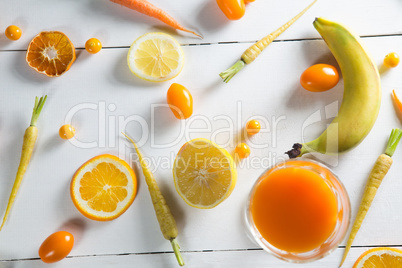 Overhead view of various fruits with juice