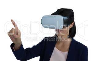 Businesswoman gesturing while using virtual reality headset