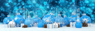 3d render - blue and silver christmas baubles over bokeh backgro