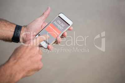 Composite image of online payment text on gray mobile display