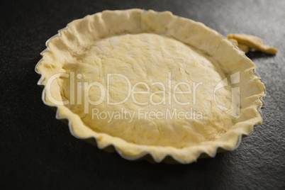 High angle view of pastry dough in backing pan