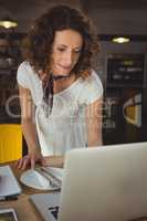 Businesswoman using laptop