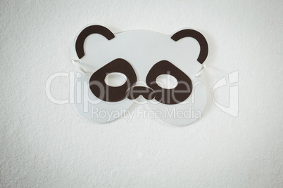 High angle view of panda mask