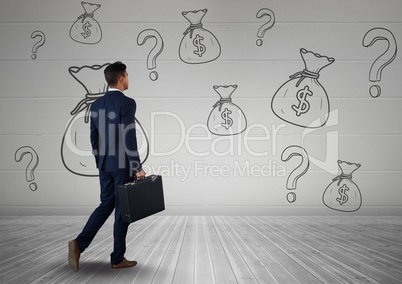 businessman in front of money on wall