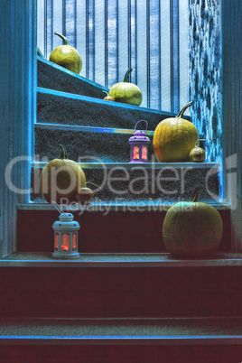 Pumpkins and lanterns on the steps in the house