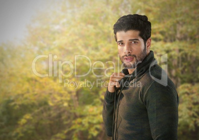 Man in Autumn posing in forest