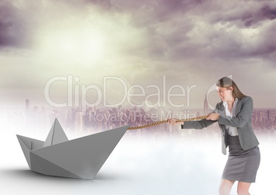 Businesswoman pulling paper boat with rope in city sky