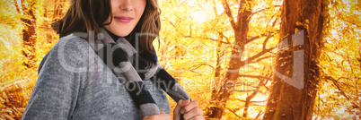 Composite image of portrait of young woman in scarf