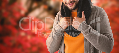 Composite image of smiling man posing against black background