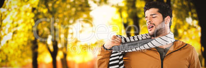 Composite image of young man wearing scarf posing against white background