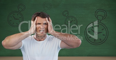 frustrated man with clocks