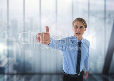 Businessman touching the air with windows