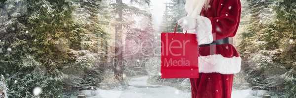 Santa with Winter landscape holding shopping
