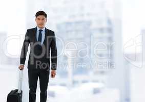 Businessman standing in front of city