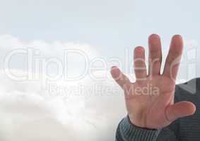 Hand open with bright clouds background