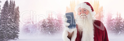 Santa Claus in Winter with phone