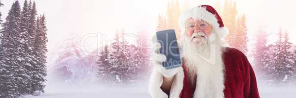 Santa Claus in Winter with phone