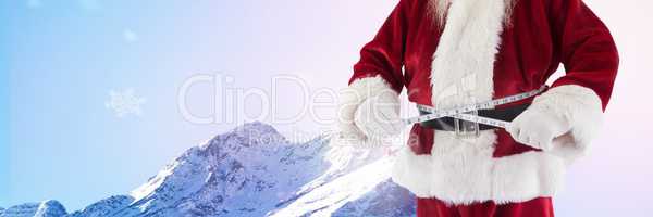 Santa Claus in Winter with measuring tape around waist