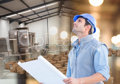 man with box in warehouse, transition