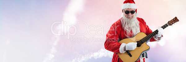 Santa Claus in Winter with guitar