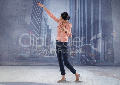 woman posing with arms in city room