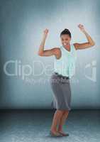 Businesswoman celebrating with arms up