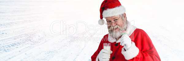 Santa Claus in Winter with milk and cookie