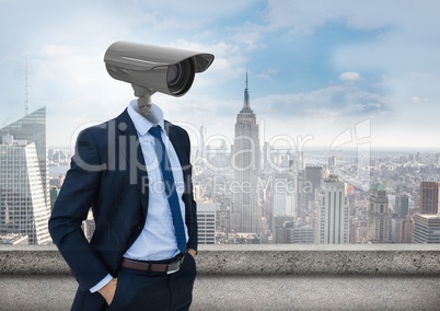 Businessman with CCTV head with city skyline