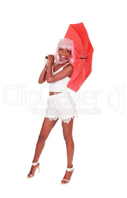 Gorgeous woman standing with a red umbrella