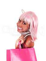 Closeup of woman with shopping bag and bunny ears