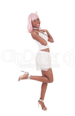 Happy African woman in white shorts