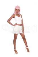 Surprised African woman in white shorts